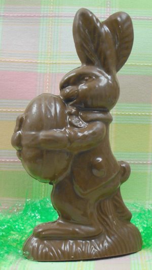 Chocolate Bunny Holding Easter Egg